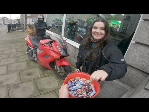 Santa Spreads Christmas Joy Delivering Chocolates To People